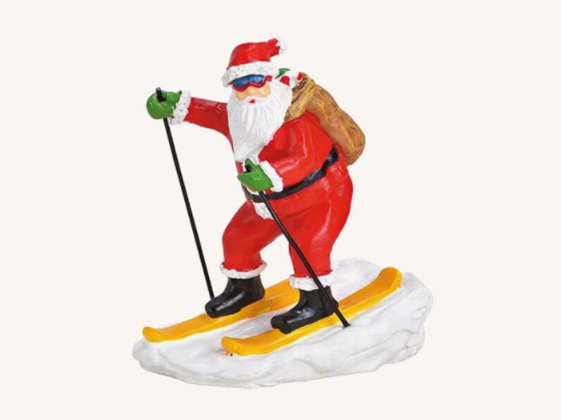 Miniatur Weihnachtsfigur Winterszene Lichthaus Winterwelt Figur - Cooler Nikolaus auf Ski - aus Poly (bunt) B6 x T4 x H5cm