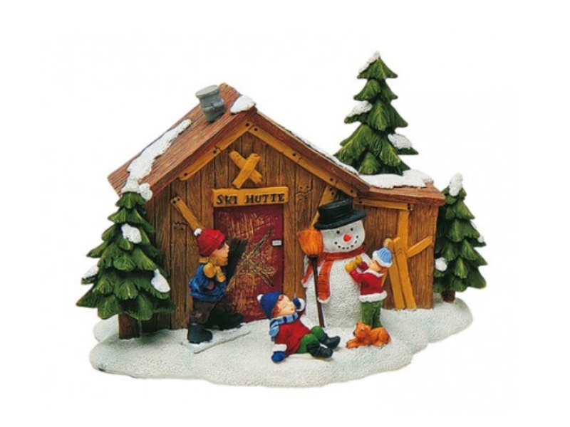 Weihnachtliche Miniatur-Figuren Winterwelt-Szene aus Poly - Skihütte mit Kindern